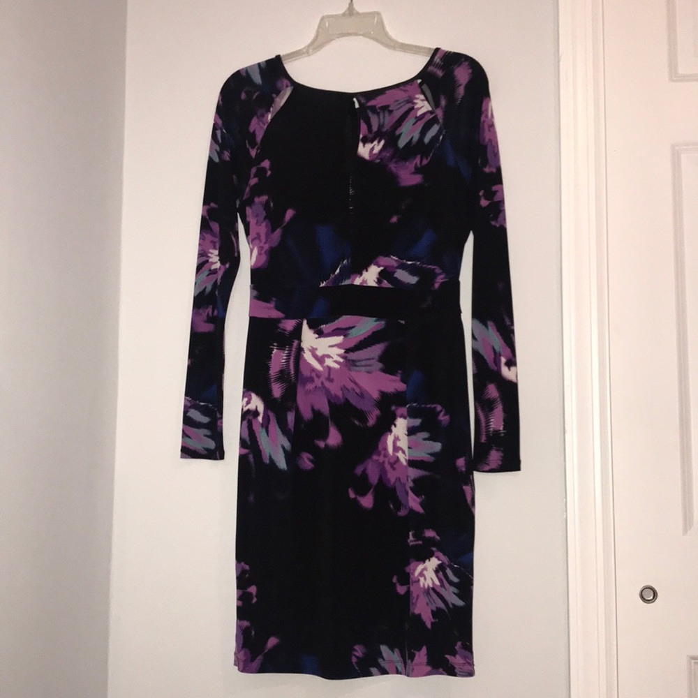BEAUTIFUL black fitted JLO dress .